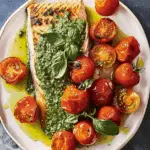 Salmon With Pesto And Blistered Tomatoes