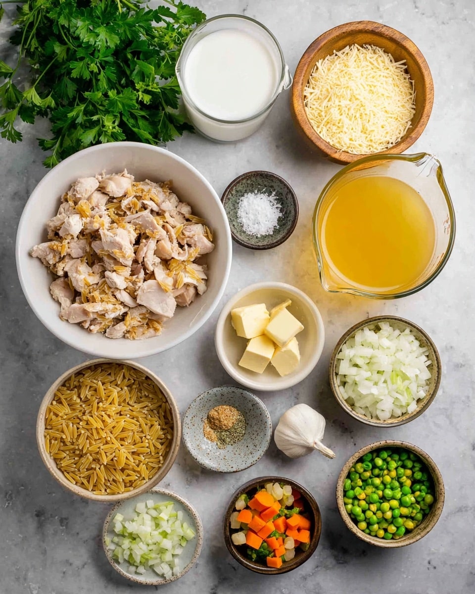 This image shows a flat lay of various cooking ingredients arranged on a white marbled surface. In the center, there is a white bowl filled with pieces of cooked chicken with golden brown edges. Around it, starting from the top center and moving clockwise, there is a wooden bowl full of grated cheese, a clear glass measuring cup with yellow broth, a small bowl with two pieces of butter, a bowl with chopped green celery, a smaller bowl with minced garlic, a white dish holding salt, pepper, and herbs, a small white bowl with mixed peas and small carrot cubes, a dark bowl of chopped white onions, a small brown bowl with uncooked orzo pasta spilling a few grains, and a glass cup of white milk. At the top left, fresh green parsley leaves add color. Photo taken with an iphone --ar 4:5 --v 7