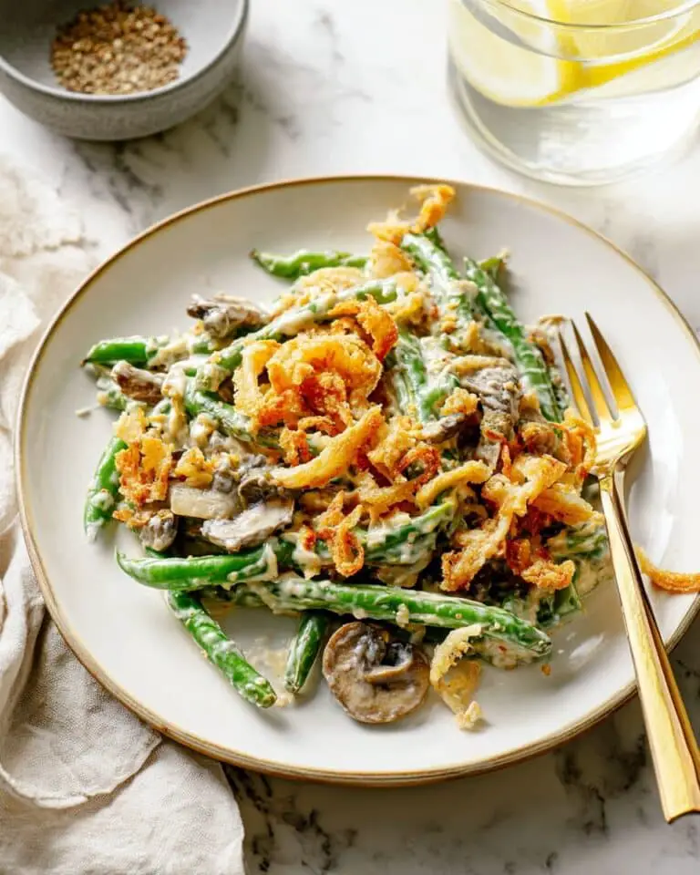 Creamy Green Bean Casserole with Mushrooms, Fried Onions, and Parmesan Recipe
