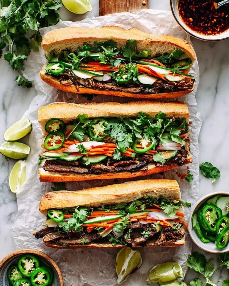 Vietnamese Pork Bănch Mi Sandwich with Pickled Vegetables and Fresh Herbs Recipe