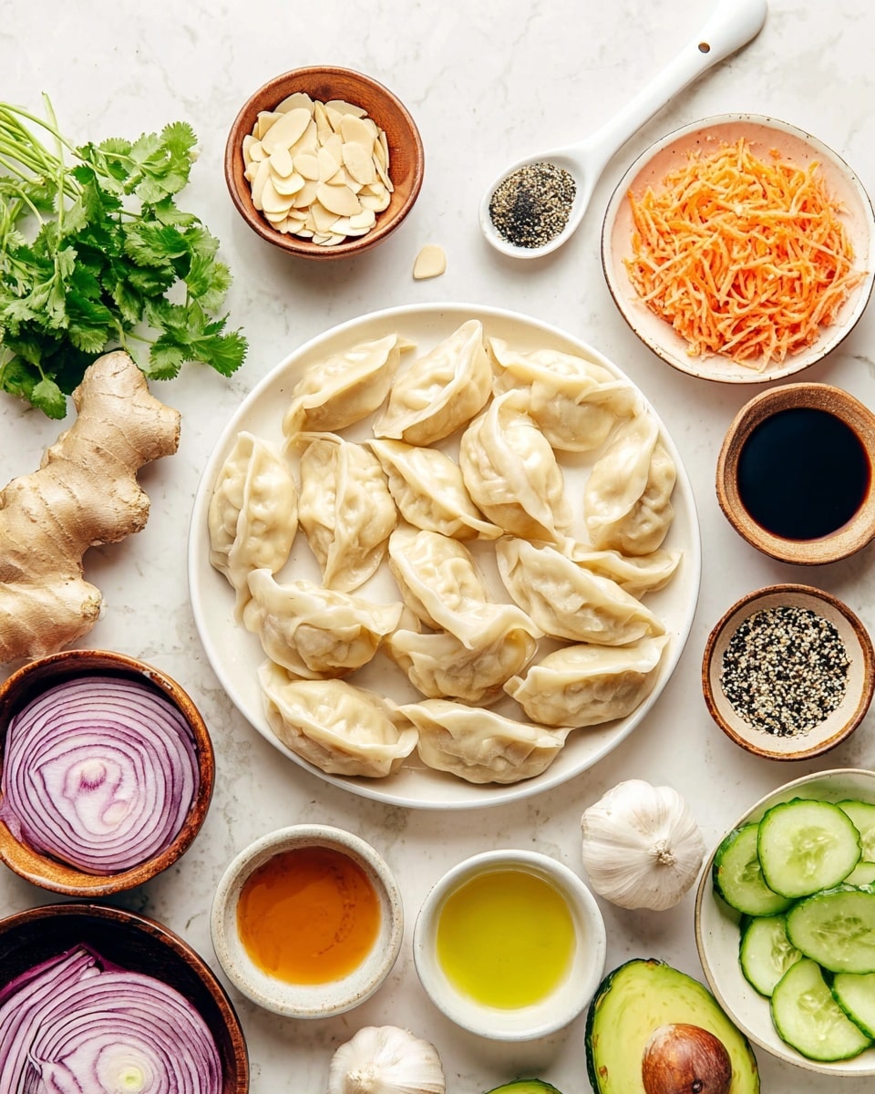 A round white plate in the middle holds a pile of light beige dumplings with soft, folded edges and a smooth, slightly shiny texture. Around the plate are small white bowls and dark wooden bowls filled with different ingredients: thinly sliced purple onion layers arranged in a spiral shape, a bunch of fresh green cilantro leaves, grated orange and white shredded vegetables in a large white bowl, halved green avocados with one seed visible, sliced green cucumbers in a bowl, and a small bowl of light brown almond slices. There are also small white bowls with various sauces and seasonings including a dark soy sauce, a golden yellow oil, lighter brown and clear liquids, and a wooden bowl containing a black and white crumbly seasoning. A white spoon with a beige spice is at the top. Fresh ginger and a clove of garlic rest on a small white dish on the left side. All items are arranged on a white marbled surface. photo taken with an iphone --ar 4:5 --v 7