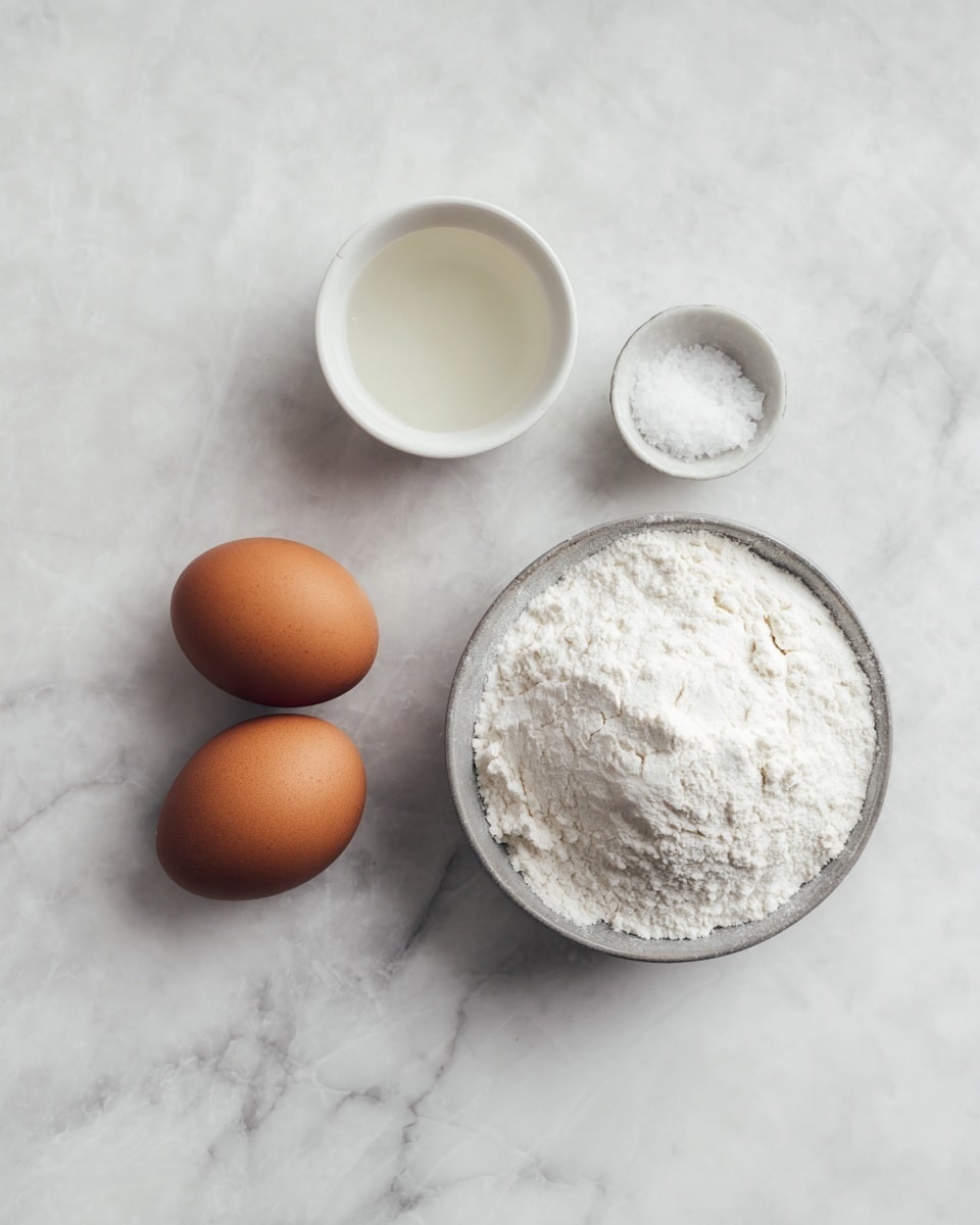 Two brown eggs are placed on a white marbled surface near a small white bowl filled with clear liquid, a greyish bowl with white flour piled high, and a tiny white bowl holding a small amount of white salt. The ingredients are spaced out simply and clearly on the surface, giving a clean and fresh look. Photo taken with an iphone --ar 4:5 --v 7