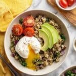 Quinoa Breakfast Bowl with Poached Eggs, Avocado, and Tomatoes Recipe