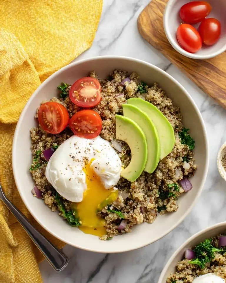 Quinoa Breakfast Bowl with Poached Eggs, Avocado, and Tomatoes Recipe