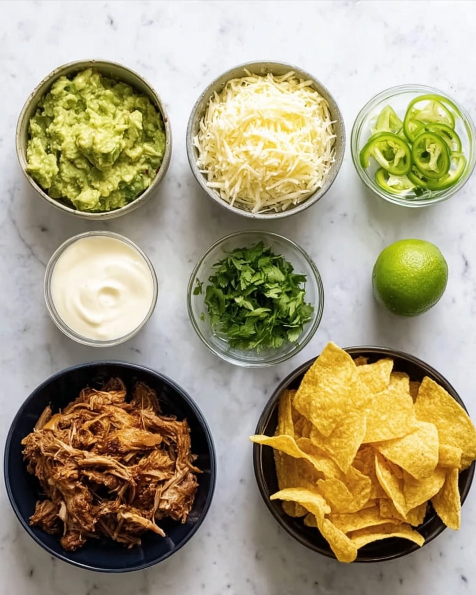 There are seven small bowls and glasses arranged on a white marbled surface. The top row shows a bowl of green guacamole on the left, a bowl of shredded white cheese in the middle, and two smaller clear bowls on the right with green herbs and thin green sliced peppers. To the right of those is a half lime. The bottom row has a glass of white creamy sauce on the left, a black bowl filled with shredded dark brown cooked meat in the middle, and a black bowl on the right with many golden yellow tortilla chips. Photo taken with an iphone --ar 4:5 --v 7
