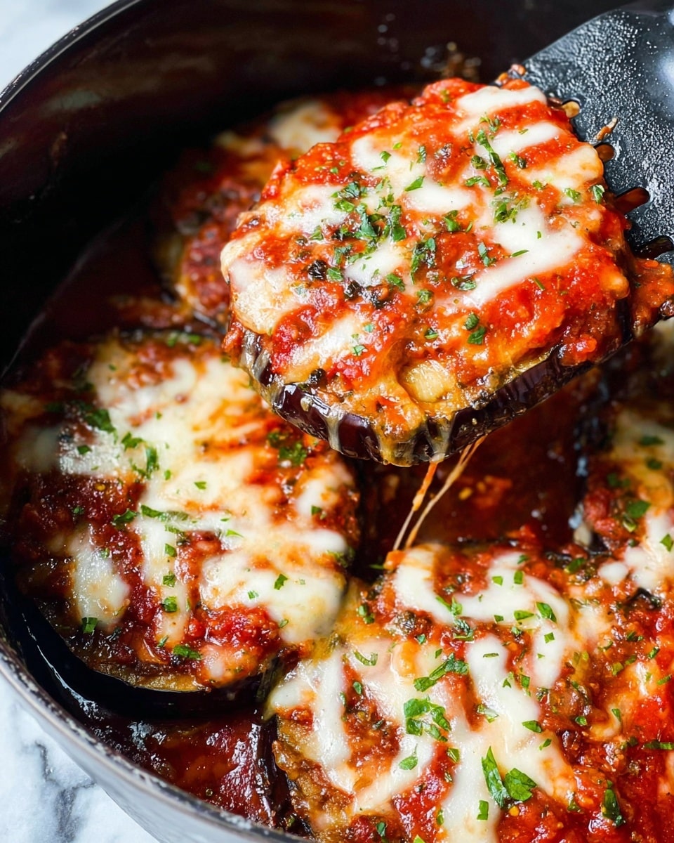 A close-up view of a layered dish held by a woman's hand, showing three visible layers: the bottom layer is a rich brown base with a soft texture, the middle layer is a bright red sauce with some small bits of ingredients visible, and the top layer is a melted white cheese spread unevenly with some green herbs sprinkled on top for garnish. The dish is held over a black slow cooker with a shiny interior, and the background is a white marbled surface. photo taken with an iphone --ar 4:5 --v 7