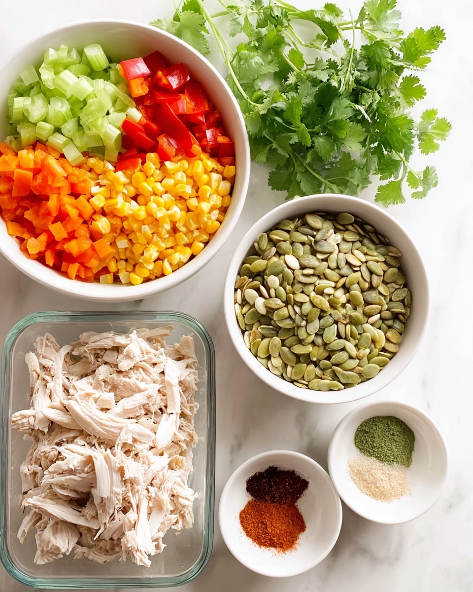 The image shows five containers with different ingredients arranged on a white marbled surface. At the top left, a white bowl is divided into four colorful sections: light green chopped celery and green onion, red diced bell peppers, orange diced bell peppers, and bright yellow corn kernels. Behind this bowl is a bunch of fresh green cilantro leaves. To the right of it, there is another white bowl filled with green pumpkin seeds. Below these, a rectangular glass container holds shredded white chicken meat with soft texture. To the right of the glass container, a small white bowl is separated into three piles of spices: a dark red powder, a light beige powder, and a medium green powder. The overall scene is bright and clean. photo taken with an iphone --ar 4:5 --v 7