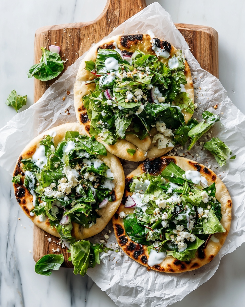 A single round flatbread or pancake is shown being lifted in a black frying pan with a metal spatula. The flatbread has one layer with a crispy, golden brown top speckled with green herbs and darker browned spots that show a crunchy texture. The base layer visible beneath is pale white and soft. The frying pan's surface is black with some shiny oil spots. The background out of focus shows some patterned fabric. photo taken with an iphone --ar 4:5 --v 7