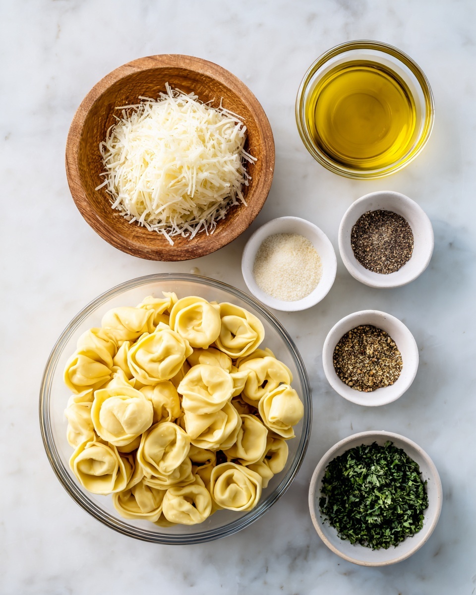 The image shows bowls with different ingredients on a white marbled surface. At the bottom center, there is a clear bowl full of pale yellow cheese tortellini, shaped like small filled pasta rounds. Above it, there is a small round wooden bowl filled with shredded white parmesan cheese. To the right, a clear glass bowl holds golden yellow olive oil. Surrounding these are small white bowls with seasonings: coarse white kosher salt, black pepper, pale yellow garlic powder, and a mix of green and brown Italian seasoning. At the bottom right, a white bowl contains chopped dark green parsley. Each bowl and ingredient is neatly placed and labeled. Photo taken with an iphone --ar 4:5 --v 7
