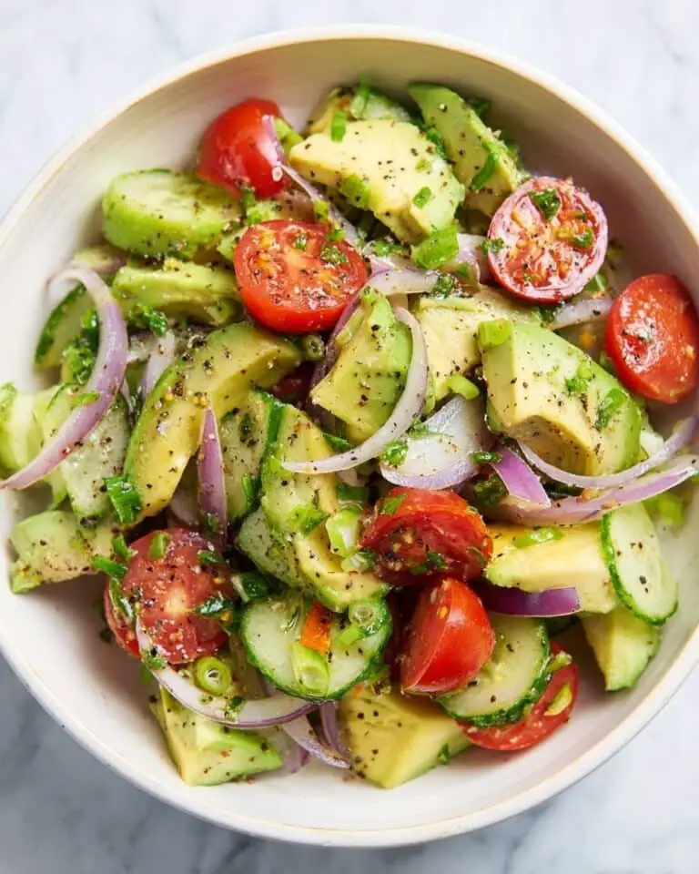 Creamy Avocado Salad with Tomato, Cucumber, and Lime Dressing Recipe