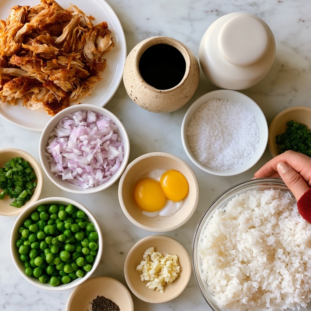 A variety of small bowls and plates are arranged on a white marbled surface. In the top left, a white plate holds shredded rotisserie chicken with a golden-brown color and uneven texture. To the right, a speckled beige ceramic jar contains dark soy sauce. Next to it, a smooth white matching jar is filled with coarse salt. Below these, a white bowl is filled with finely chopped light purple shallot pieces. At the center is a light beige small bowl with two yellow egg yolks and some white. To the left bottom, a white bowl is full of small, round, bright green peas. Surrounding these are several small beige bowls: one with chopped green onion pieces, one with minced garlic, and another with dark pepper in ground form. At the bottom right corner, a large clear glass bowl is filled with fluffy white rice. A woman's hand with a red sleeve is partially visible on the right side of the image, touching the glass bowl. photo taken with an iphone --ar 4:5 --v 7