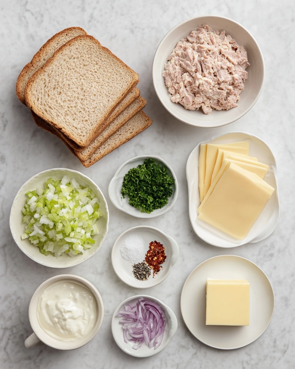 The image shows a flat lay of ingredients for a sandwich on a white marbled surface. There are four slices of light brown bread stacked on the bottom left. Above the bread is a white bowl filled with pinkish canned tuna. Next to it is a white bowl with white mayo. To the right are three individually wrapped slices of pale yellow cheese. A small white bowl with white salt and black pepper is near the cheese. Below the bread, there is a white plate with finely chopped green celery and purple onion. Next to it on the right is a small bowl filled with chopped dark green parsley. Below the parsley bowl, a small white bowl holds red chili flakes. There is also a small plate with a square piece of light yellow butter. Near the bottom right is an empty white cup. The photo taken with an iphone --ar 4:5 --v 7