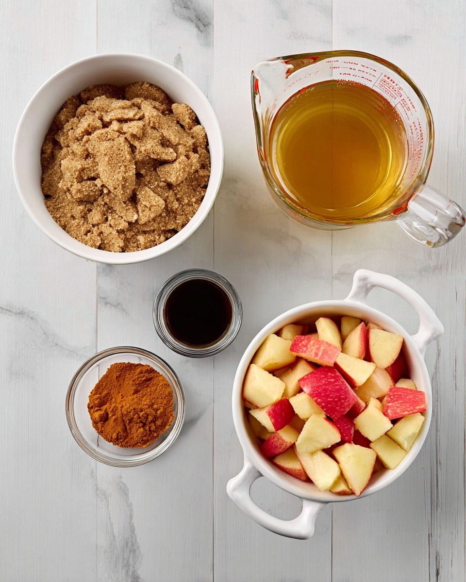 A white bowl filled with brown sugar sits on the left, next to a clear glass measuring cup with golden liquid at the top center. Below the measuring cup are two small clear bowls, one holding orange cinnamon powder and the other dark vanilla extract. On the right, a white bowl with handles contains chopped pieces of red and yellow apples. All items are placed on a white marbled surface. photo taken with an iphone --ar 4:5 --v 7